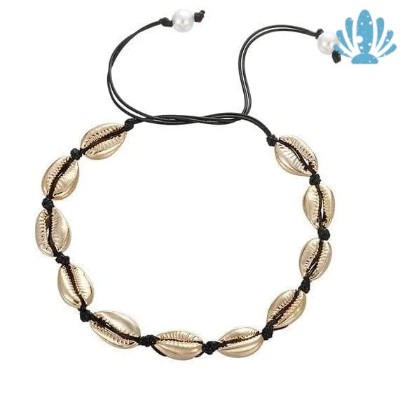 Gold cowrie shell necklace