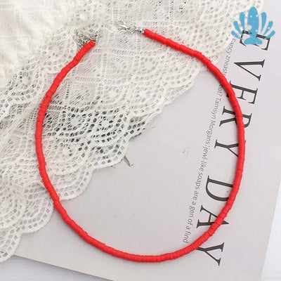 Red puka shell necklace